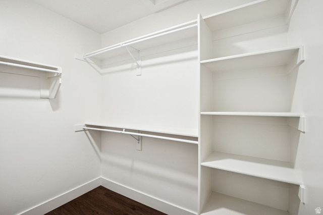 1627 North Angel Street Layton, UT 84041 - Photo 14 of 39 Walk in closet featuring dark wood-style flooring