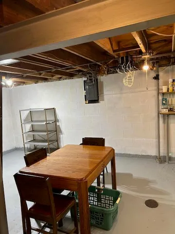 a view of a dining table and chairs in the kitchen