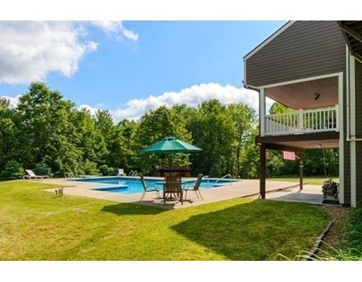 35 Bayberry Hill Road Townsend, MA 01474 - Photo 36 of 38 a swimming pool with outdoor seating and yard