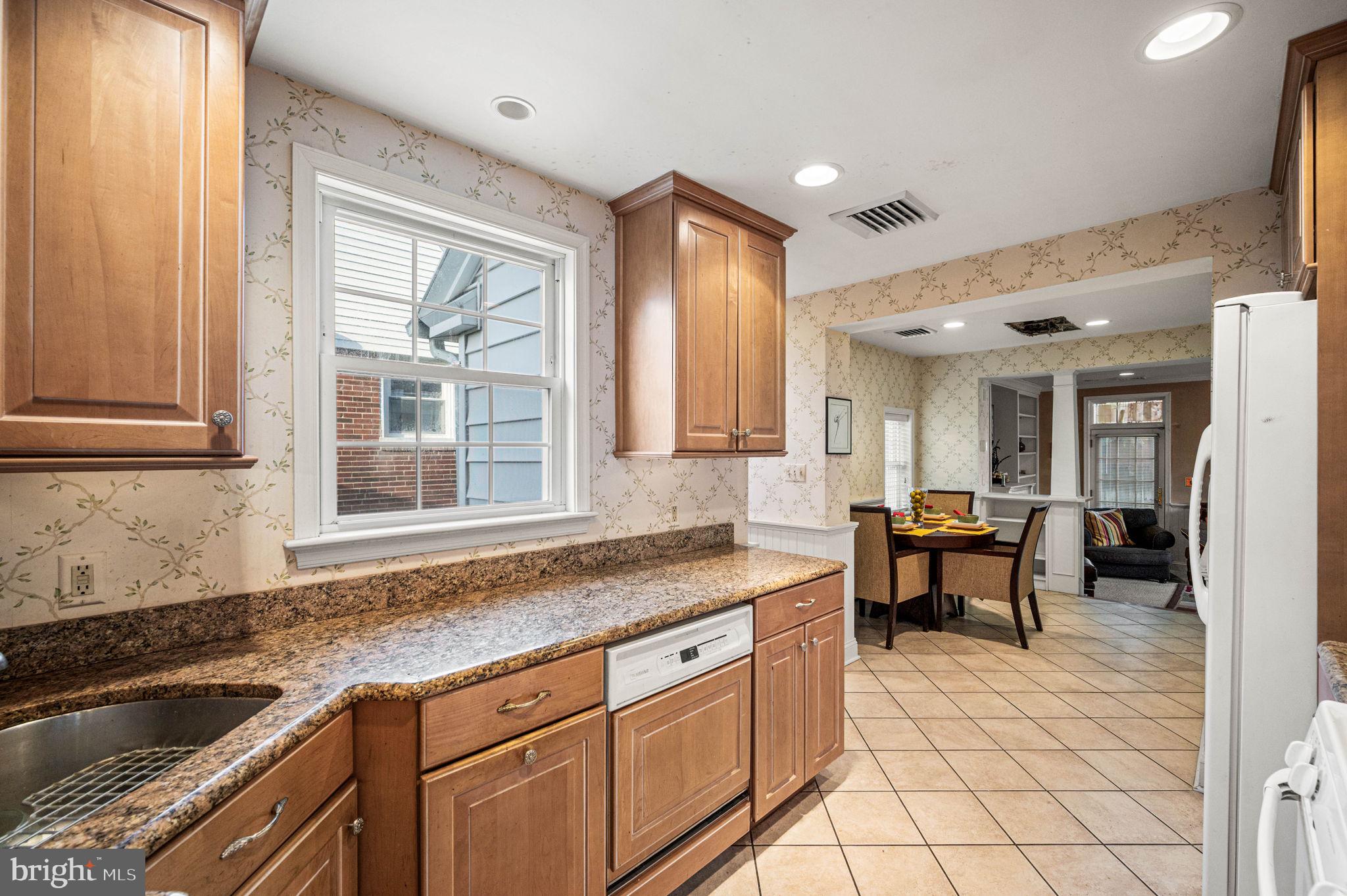 601 South Eagle Road Havertown, PA 19083 - Photo 11 of 37 a kitchen that has a sink and a stove in it
