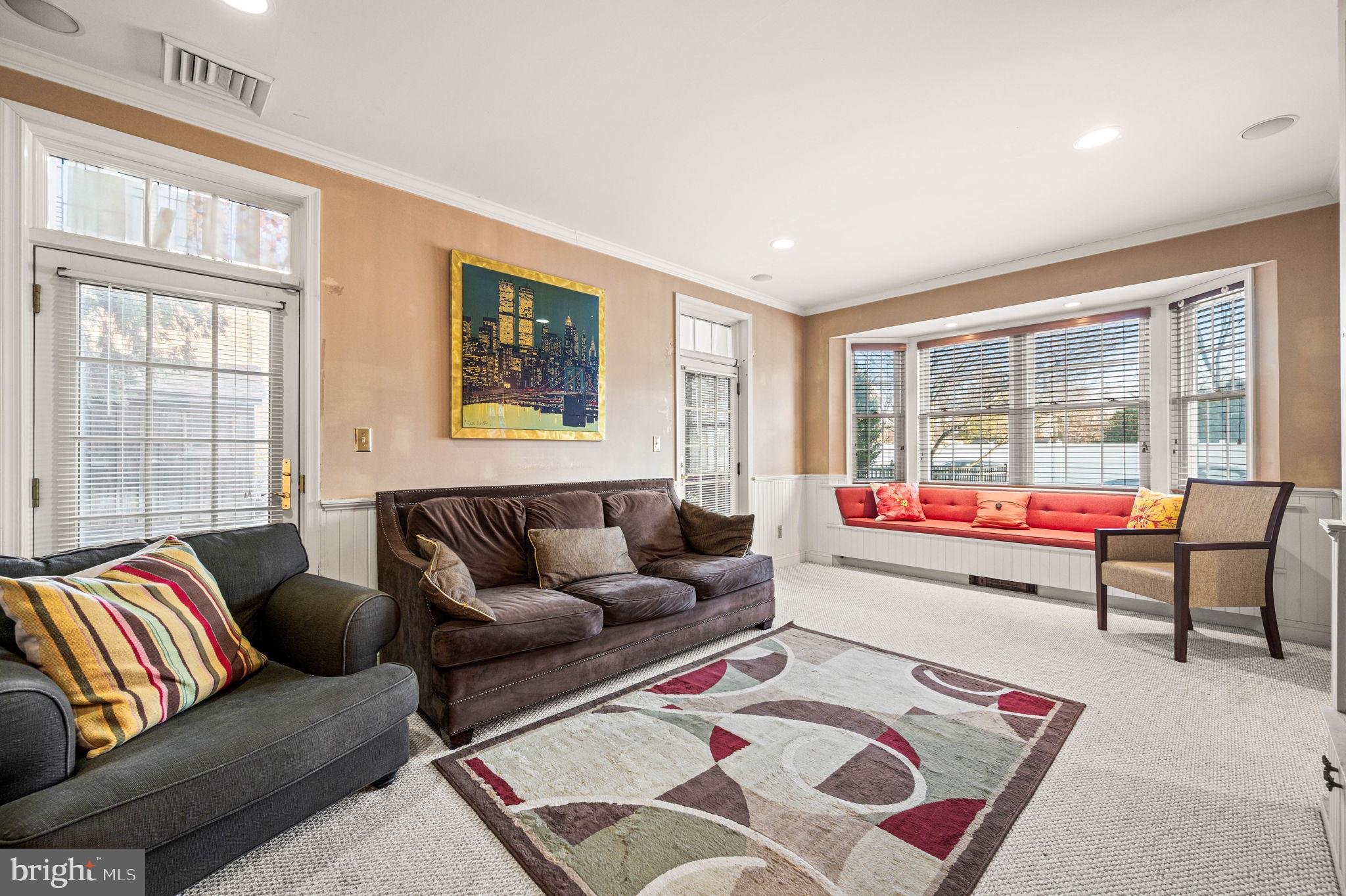 601 South Eagle Road Havertown, PA 19083 - Photo 13 of 32 a living room with furniture and a large window