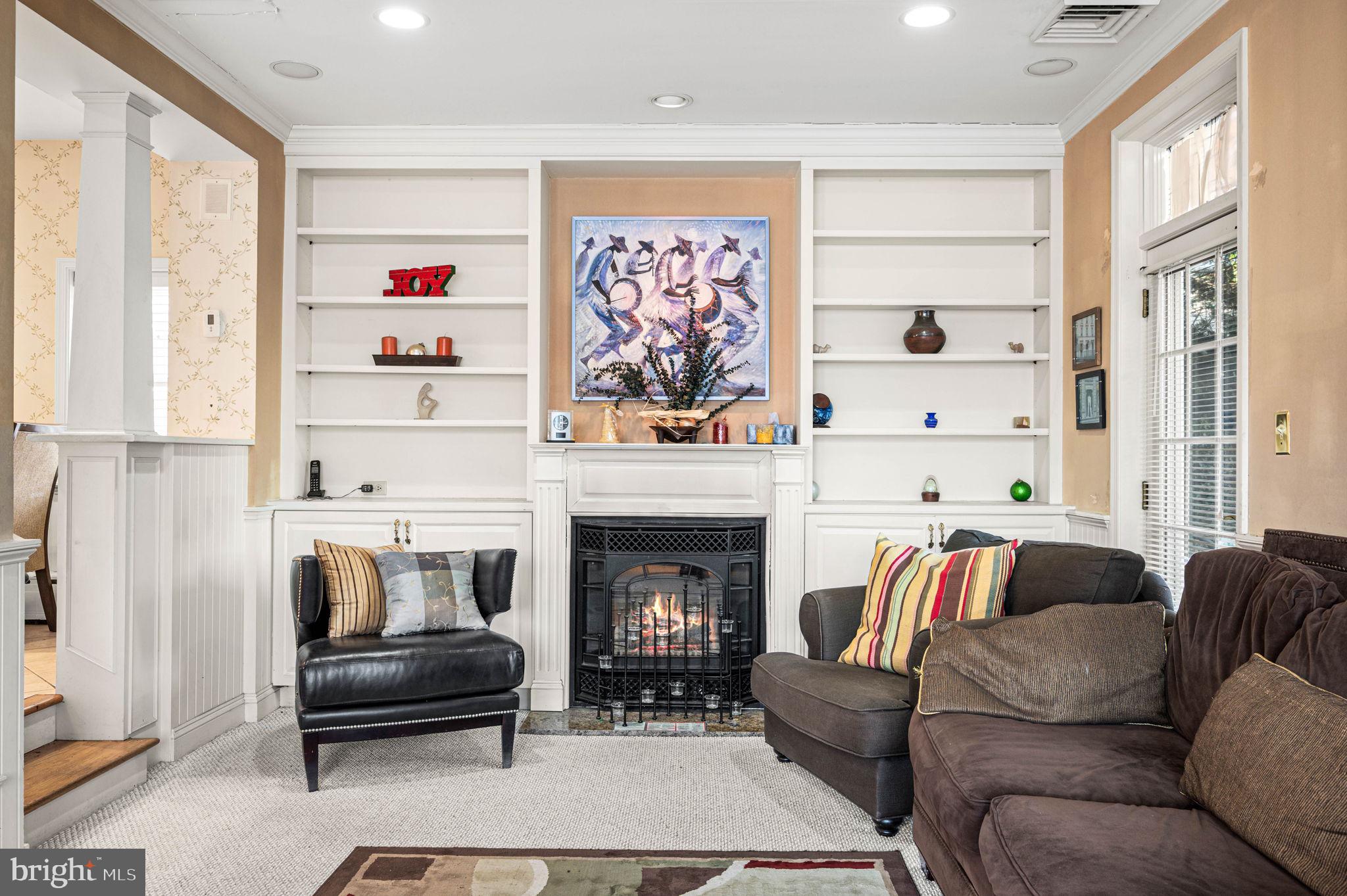 601 South Eagle Road Havertown, PA 19083 - Photo 17 of 37 a living room with furniture and a fireplace