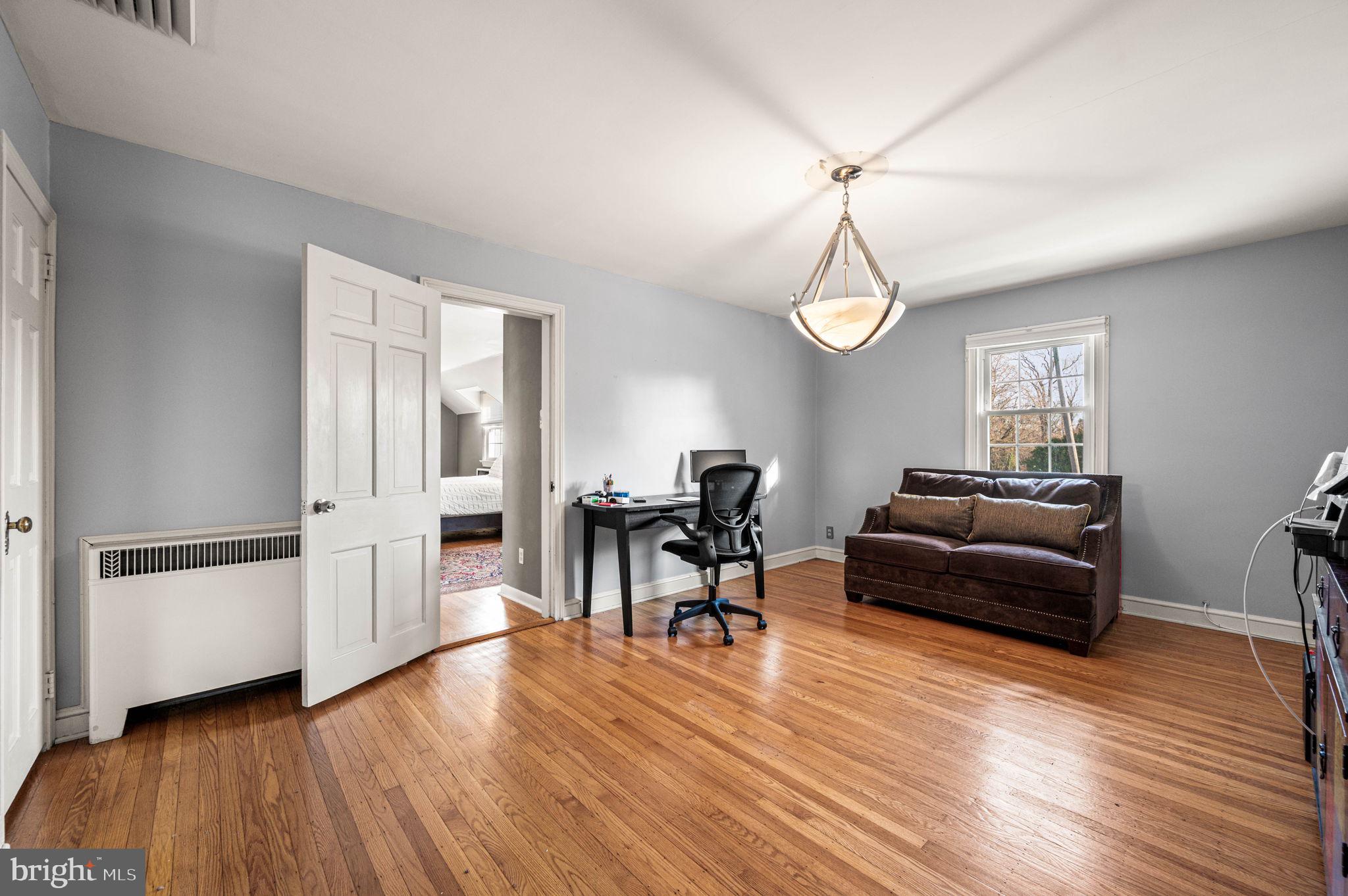 601 South Eagle Road Havertown, PA 19083 - Photo 20 of 37 a living room with furniture and a wooden floor