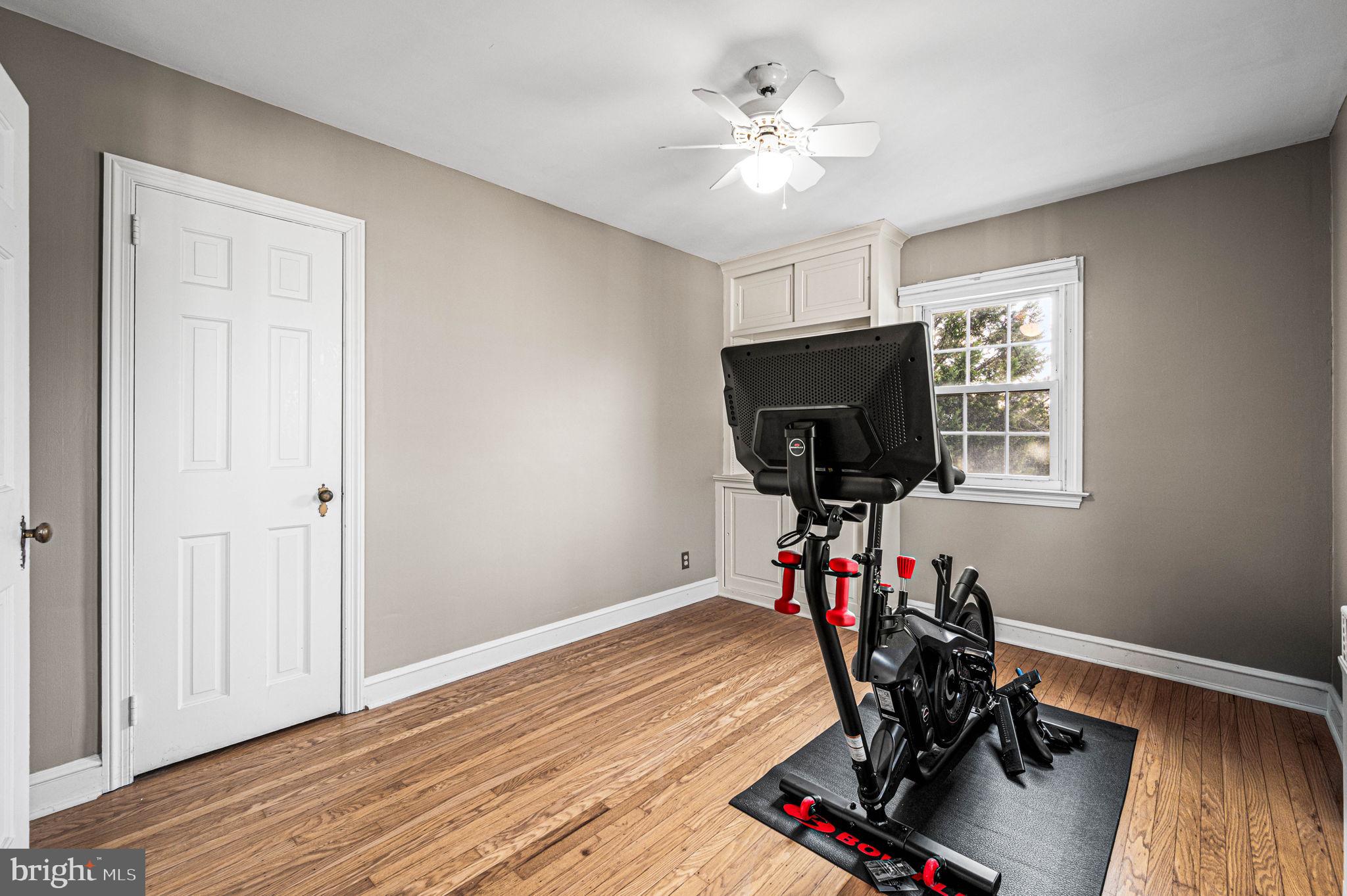 601 South Eagle Road Havertown, PA 19083 - Photo 24 of 37 a view of a workspace with wooden floor and windows