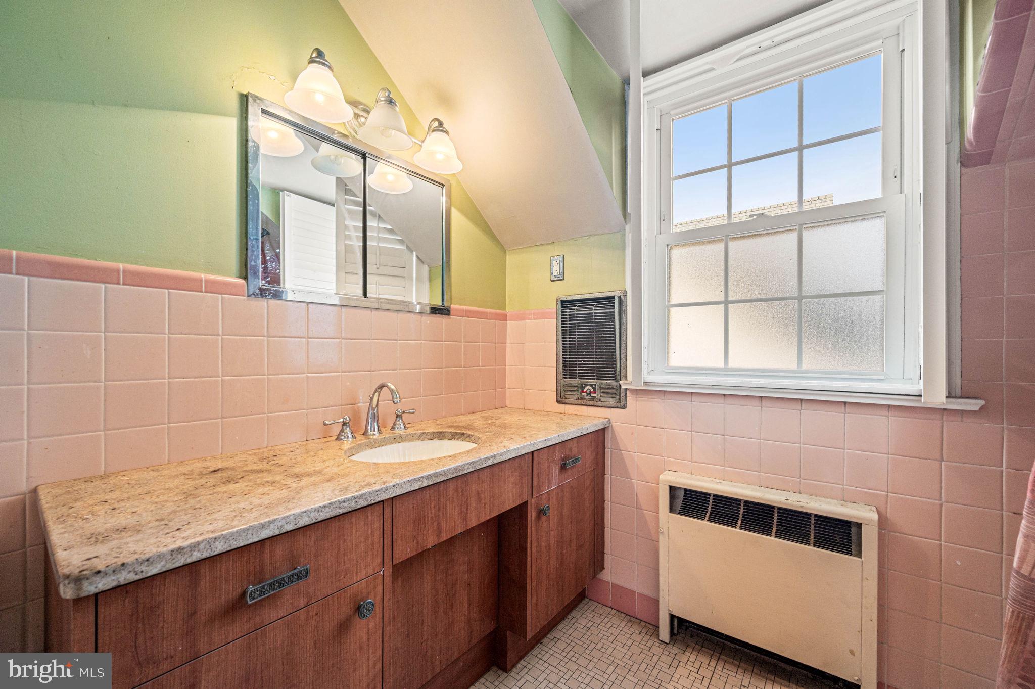 601 South Eagle Road Havertown, PA 19083 - Photo 29 of 37 a bathroom with a sink and a mirror