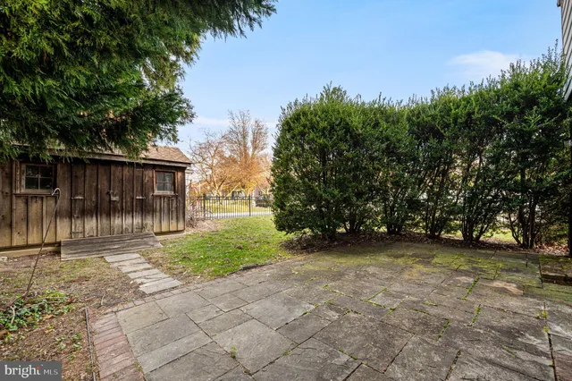 a view of backyard with green space