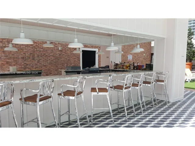 a black and white photo of a living room