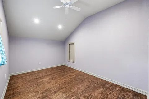 a view of livingroom with window and fireplace
