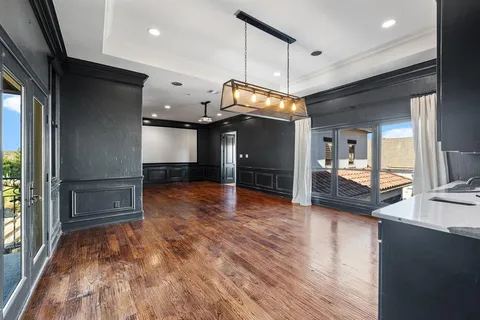 a view of a livingroom with furniture and a fireplace