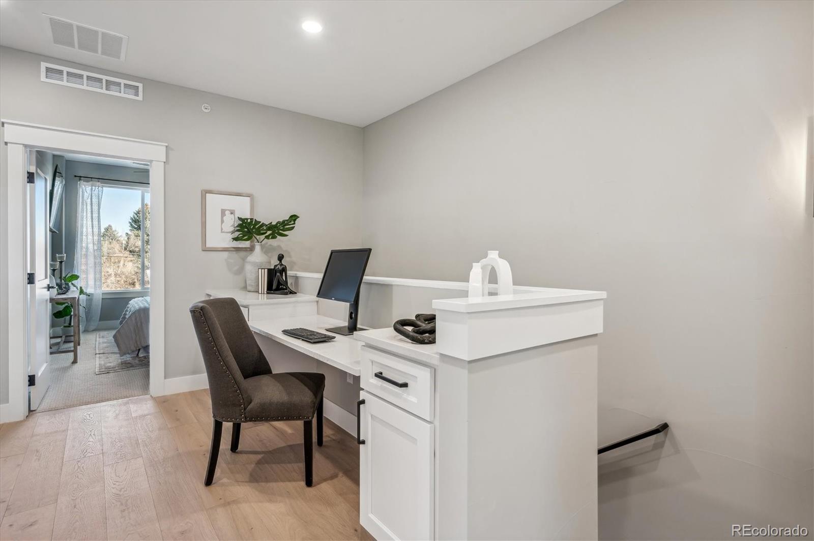364 East Orchard Road Centennial, CO 80121 - Photo 14 of 30 a view of a workspace with furniture