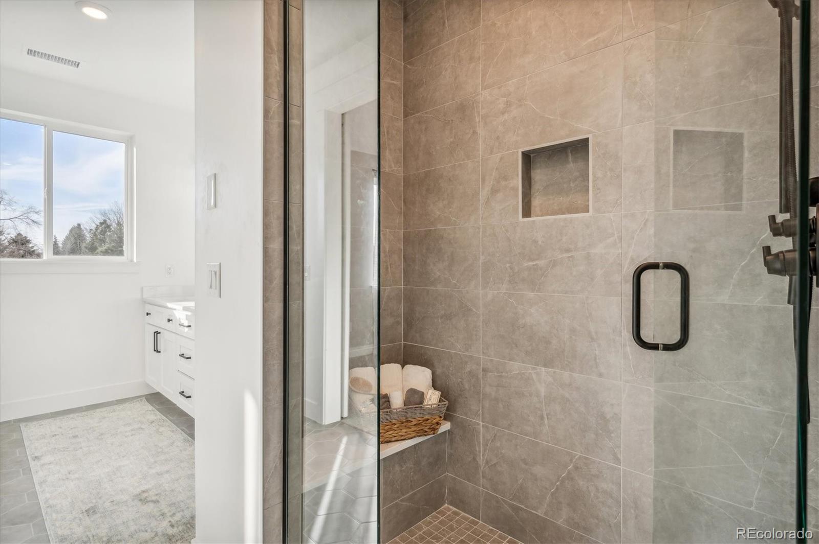 364 East Orchard Road Centennial, CO 80121 - Photo 21 of 30 a bathroom with a shower