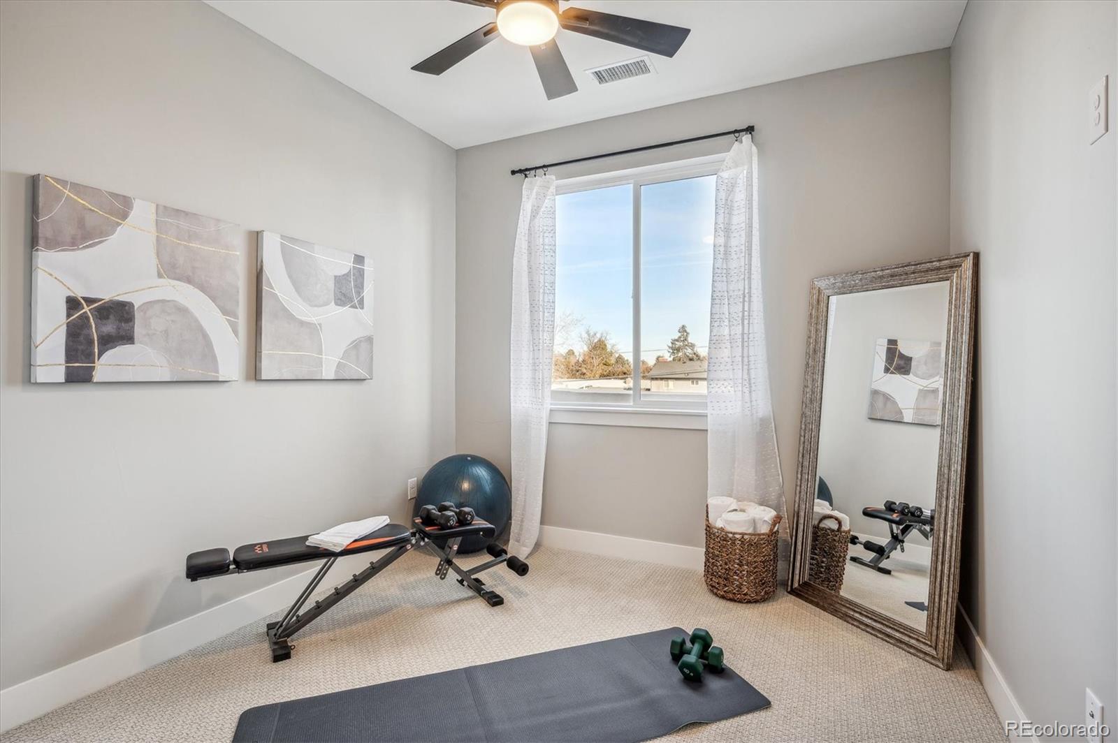 364 East Orchard Road Centennial, CO 80121 - Photo 24 of 30 a view of a workspace with gym equipment