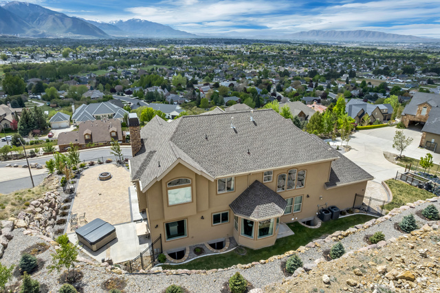 2543 East 700 South Springville, UT 84663 - Photo 71 of 73 Aerial view of residential area with a mountain backdrop