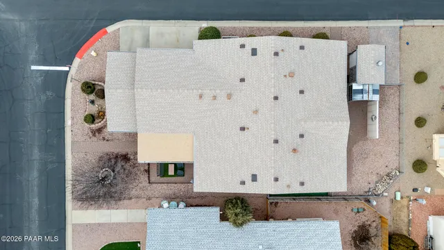 a view of a chair and table in the patio