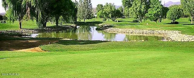 a view of a living room and kitchen