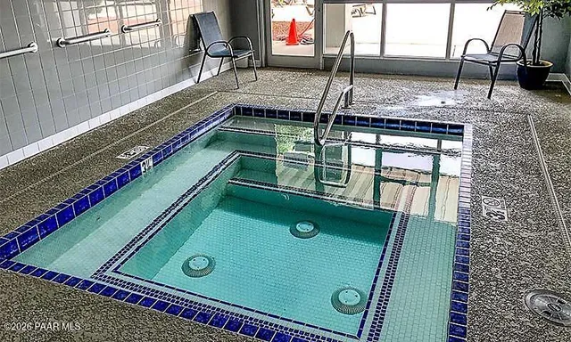 a view of a house with swimming pool