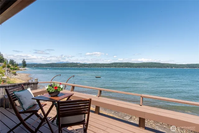a view of sitting area with furniture and stove