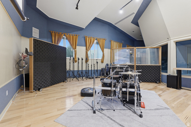 702 Alpine Highway Alpine, UT 84004 - Photo 63 of 83 Dedicated studio space featuring wood-finish flooring, acoustic wall panels, track lighting, and architectural ceiling details