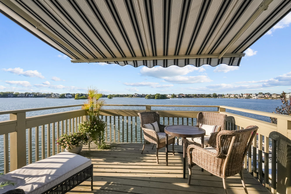 22864 Harbour Lane Plainfield, IL 60544 - Photo 19 of 65 a view of a balcony with furniture