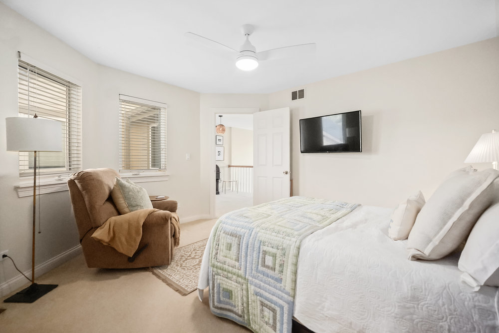 22864 Harbour Lane Plainfield, IL 60544 - Photo 24 of 65 a bedroom with a bed and flat screen tv