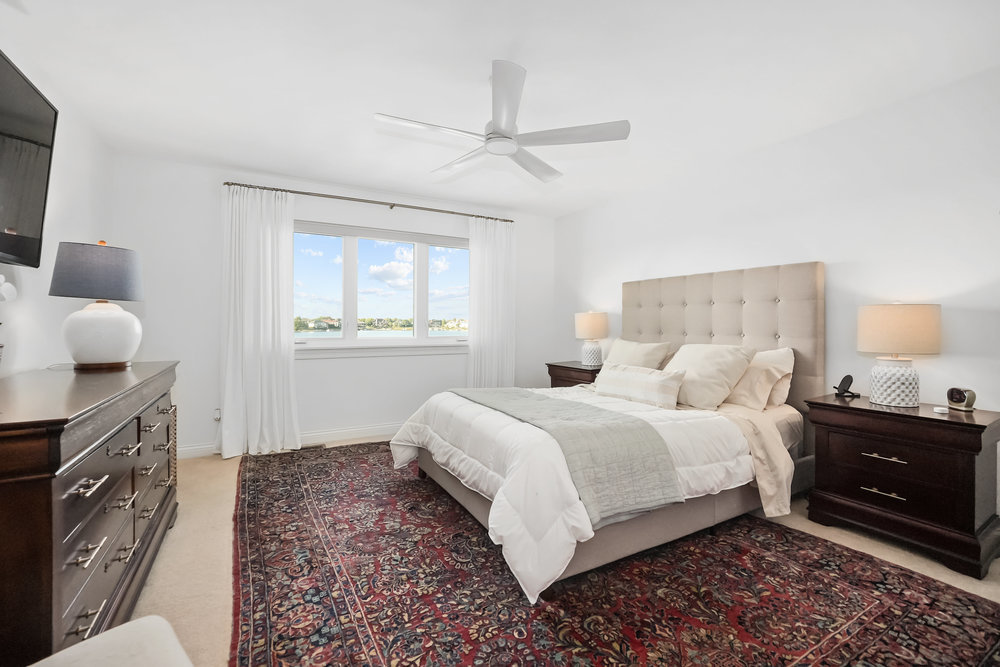 22864 Harbour Lane Plainfield, IL 60544 - Photo 26 of 65 a bedroom with a bed and a window