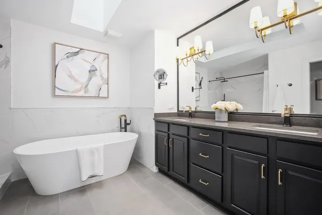 a kitchen with a sink cabinets and window