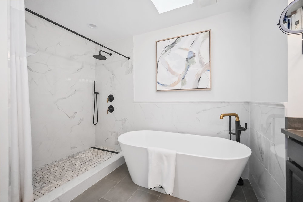 22864 Harbour Lane Plainfield, IL 60544 - Photo 29 of 65 a white bath tub sitting next to a shower