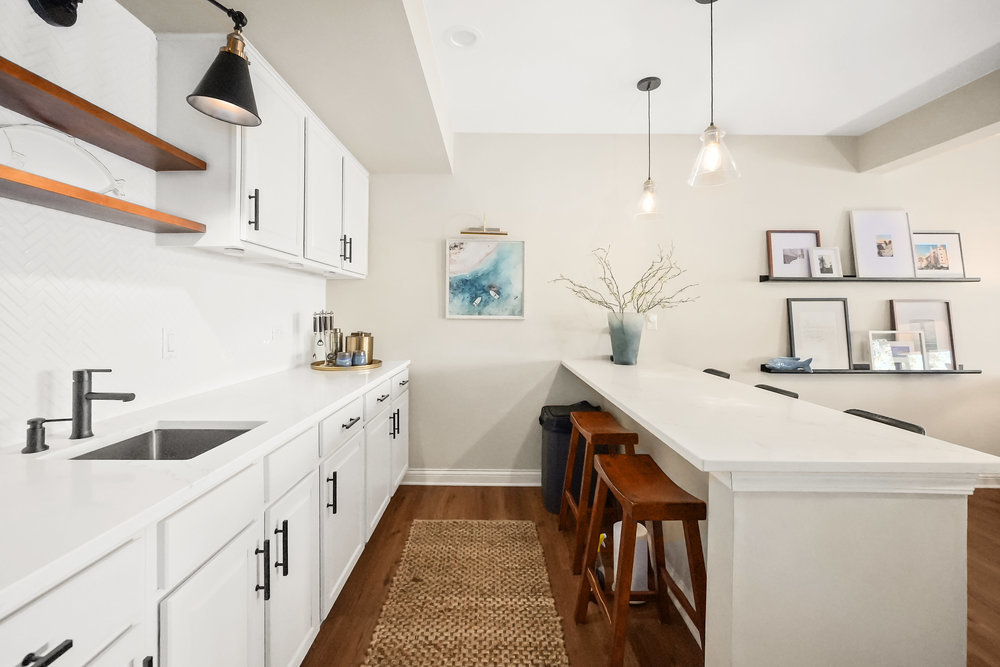 22864 Harbour Lane Plainfield, IL 60544 - Photo 33 of 65 a kitchen with sink stove and cabinets