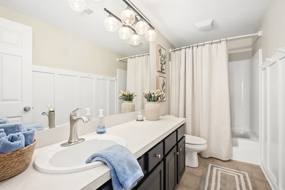 22864 Harbour Lane Plainfield, IL 60544 - Photo 38 of 65 a dining room with a table and chairs