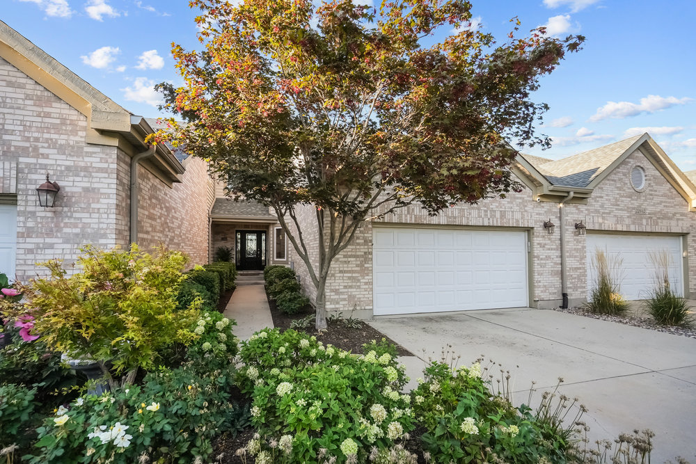 22864 Harbour Lane Plainfield, IL 60544 - Photo 4 of 65 a front view of a house with a garden