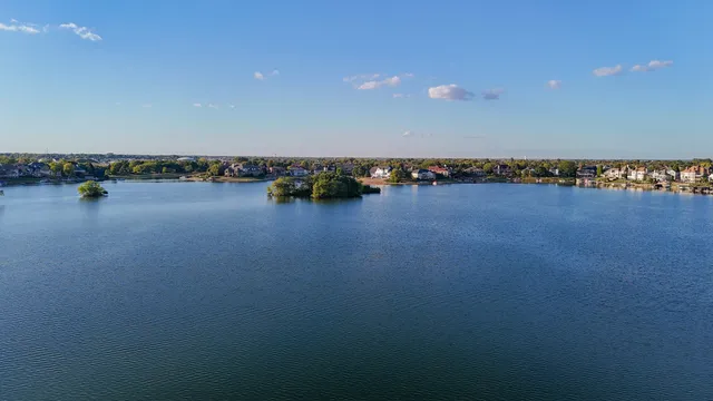 a view of a lake with houses
