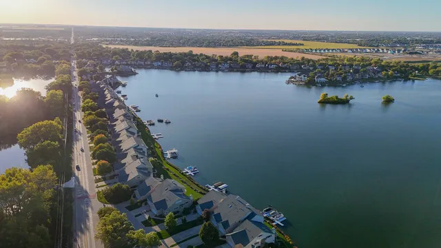 a view of a lake with sitting space