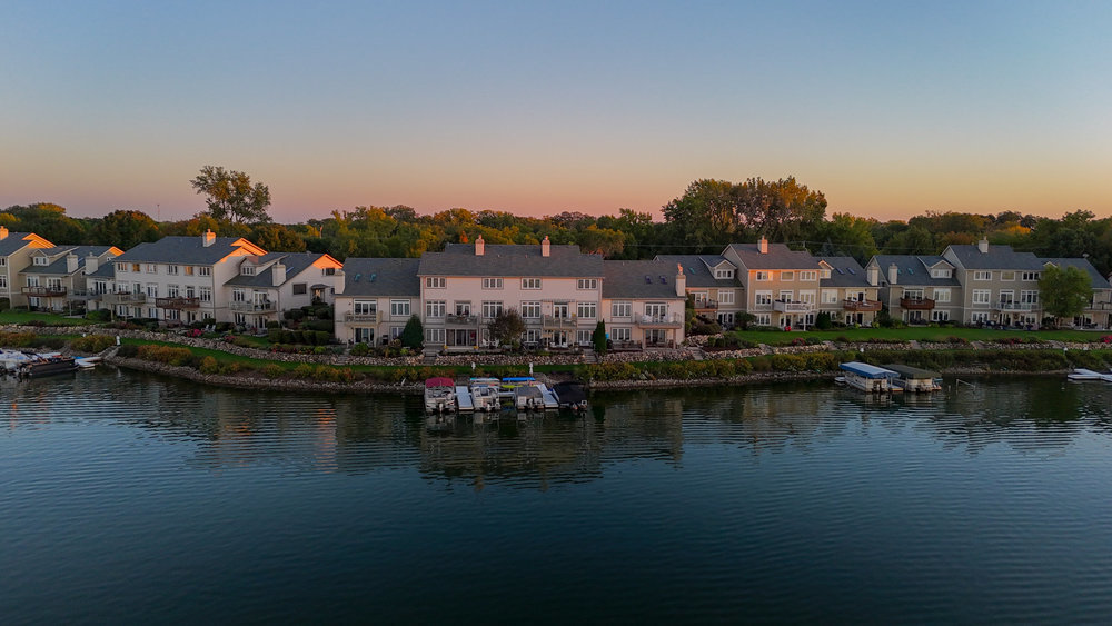 22864 Harbour Lane Plainfield, IL 60544 - Photo 55 of 65 a view of a lake with houses