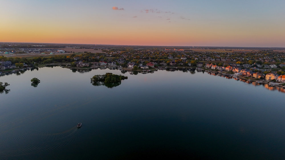 22864 Harbour Lane Plainfield, IL 60544 - Photo 58 of 65 an aerial view of ocean and residential houses with outdoor space