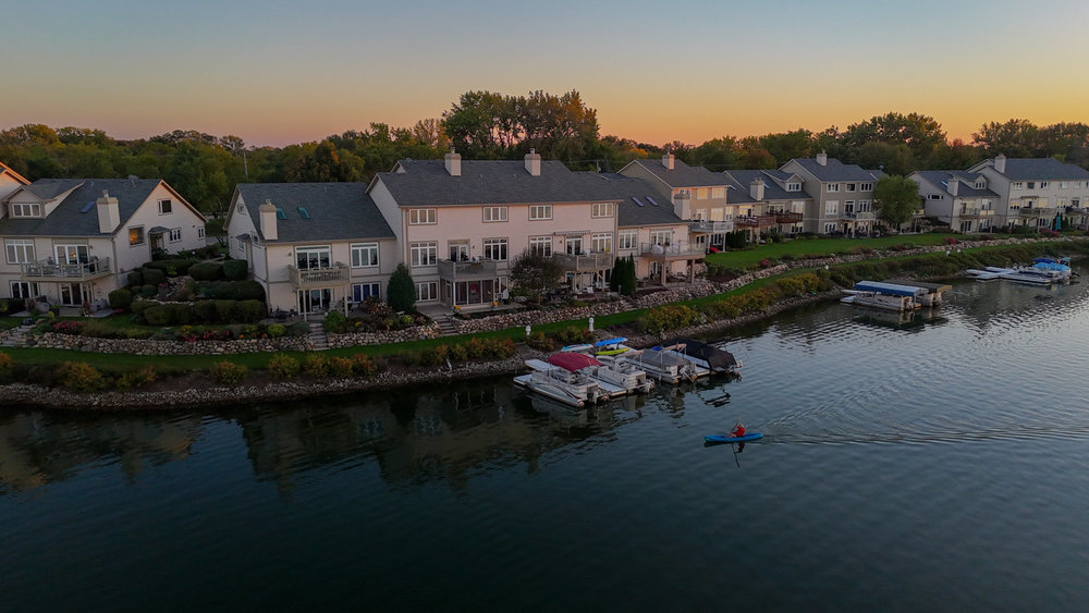 22864 Harbour Lane Plainfield, IL 60544 - Photo 59 of 65 a view of houses with outdoor space and lake view