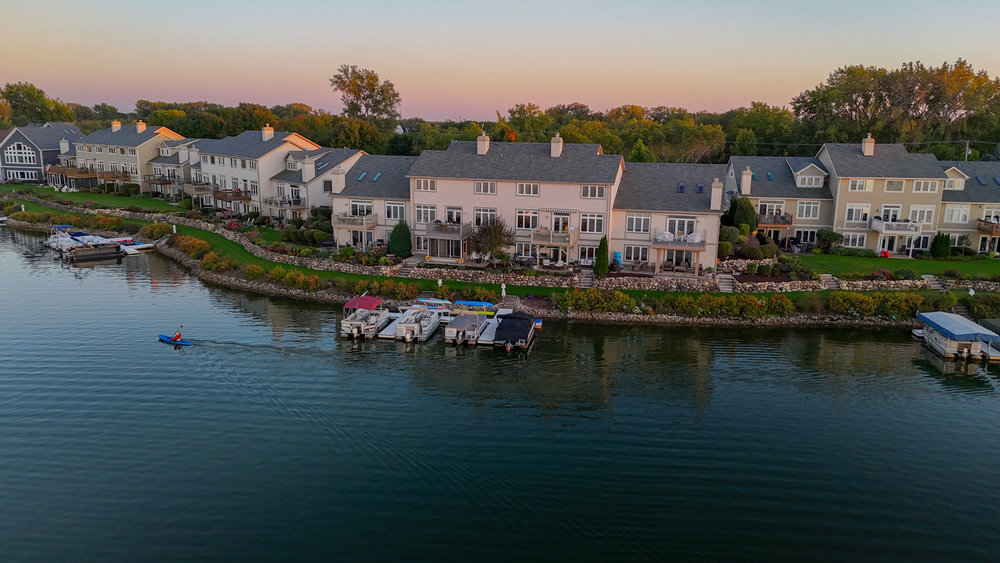 22864 Harbour Lane Plainfield, IL 60544 - Photo 60 of 65 a view of a lake with a house