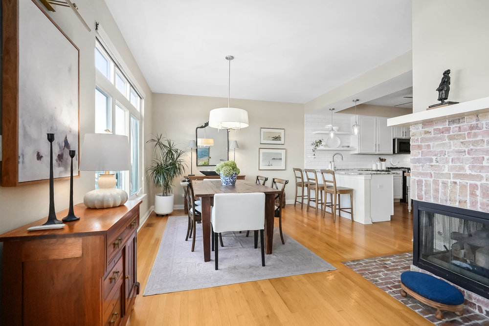 22864 Harbour Lane Plainfield, IL 60544 - Photo 8 of 65 a living room with fireplace furniture and a wooden floor
