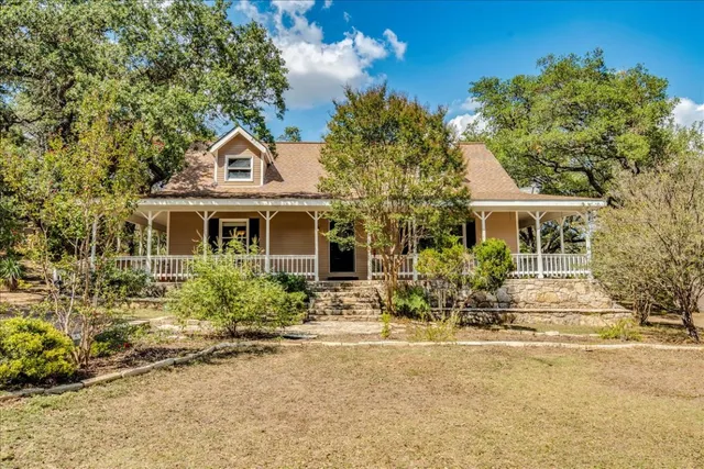 front view of a house with a patio