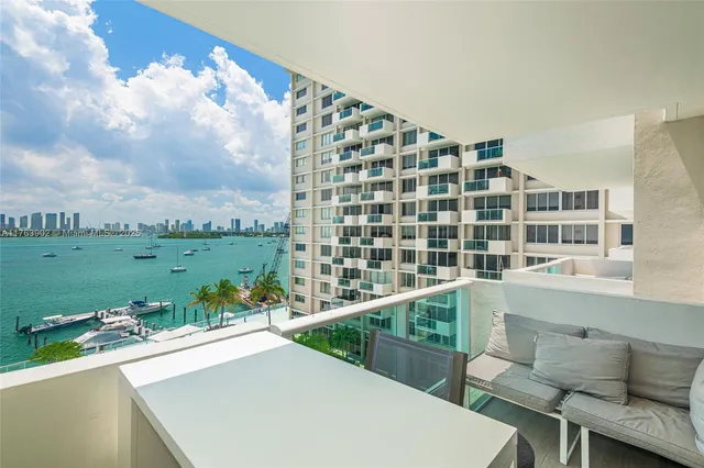 a view of swimming pool from a balcony