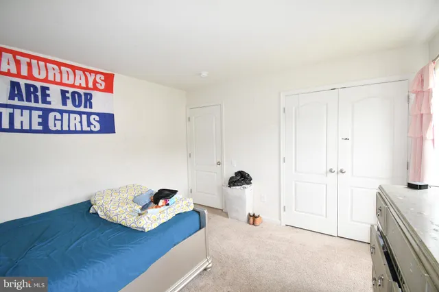 a view of kitchen with furniture and wooden floor