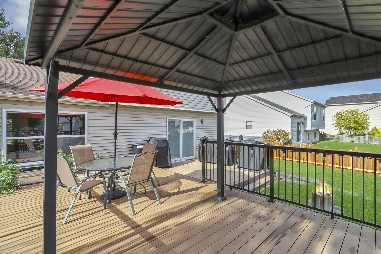 1908 Prairie Ridge Drive Plainfield, IL 60586 - Photo 12 of 34 a view of a chairs and table in the balcony