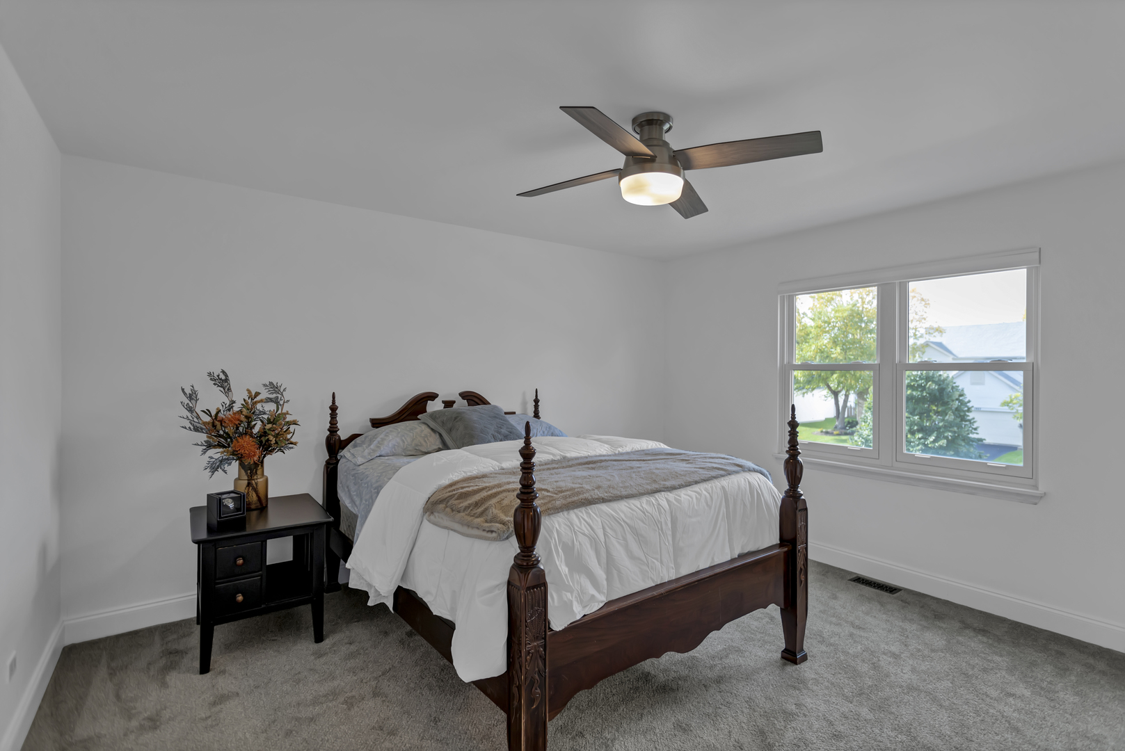 1908 Prairie Ridge Drive Plainfield, IL 60586 - Photo 17 of 34 a bed sitting in a bedroom next to a window