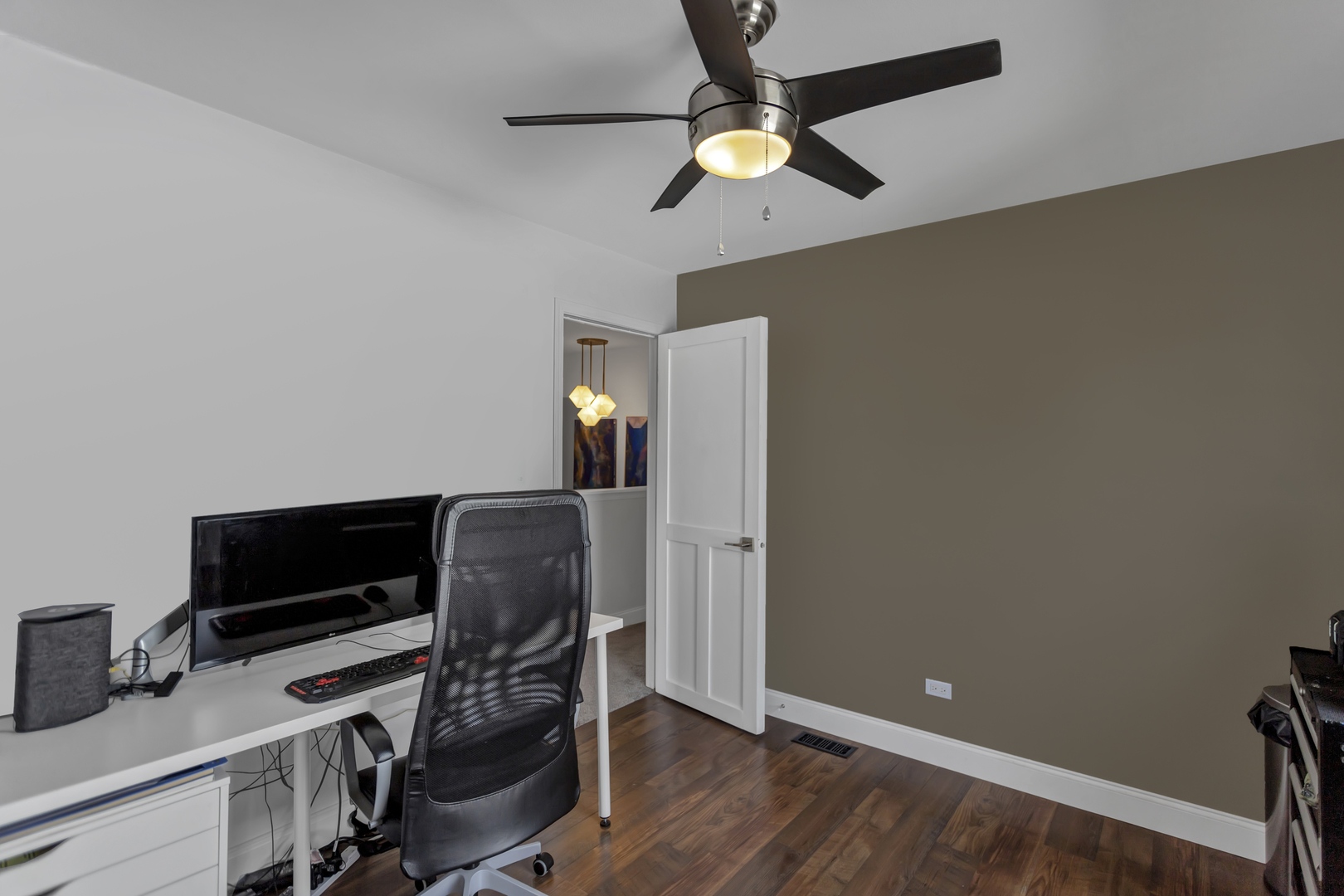 1908 Prairie Ridge Drive Plainfield, IL 60586 - Photo 21 of 34 a workspace with furniture and wooden floor