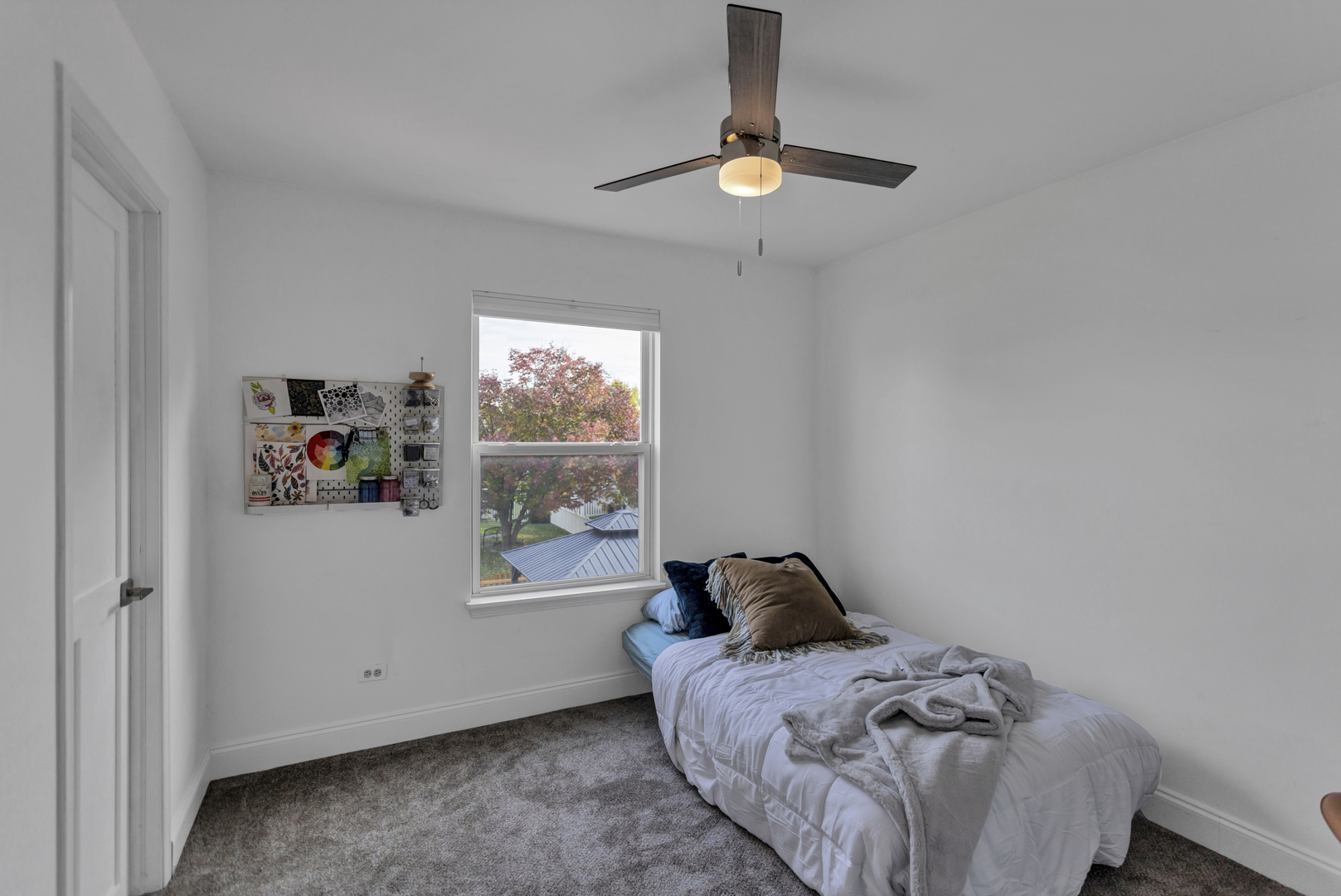 1908 Prairie Ridge Drive Plainfield, IL 60586 - Photo 22 of 34 a bed sitting in a bedroom next to a window