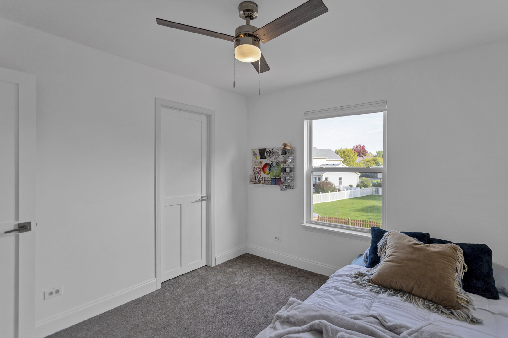 1908 Prairie Ridge Drive Plainfield, IL 60586 - Photo 23 of 34 a bedroom with a bed and a window