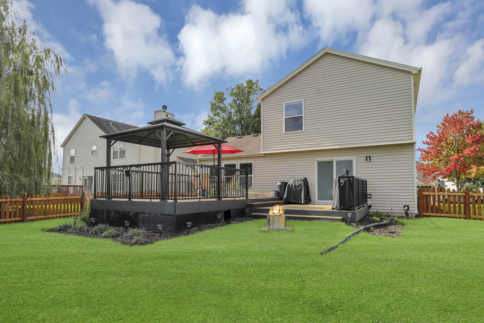 1908 Prairie Ridge Drive Plainfield, IL 60586 - Photo 32 of 34 a front view of house with garden
