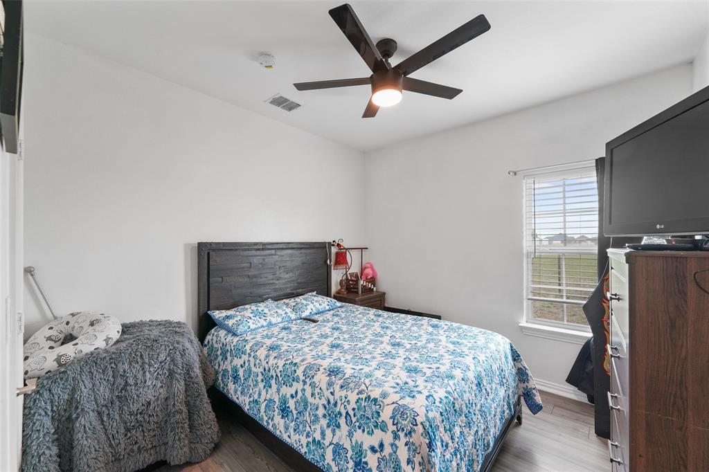 0 Ewing Road Ferris, TX 75125 - Photo 10 of 29 Room featuring a vaulted ceiling with a ceiling fan and recessed lighting
