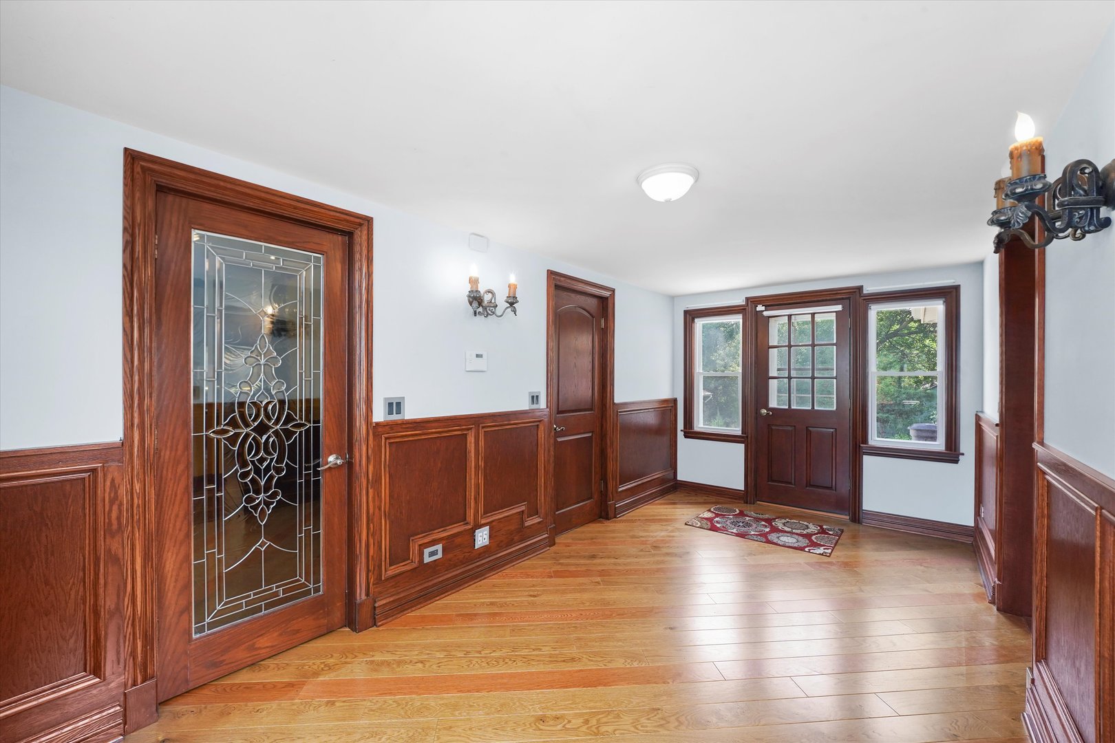 2N101 Glen Ellyn Road Glendale Heights, IL 60139 - Photo 14 of 34 a view of an empty room with window and wooden floor