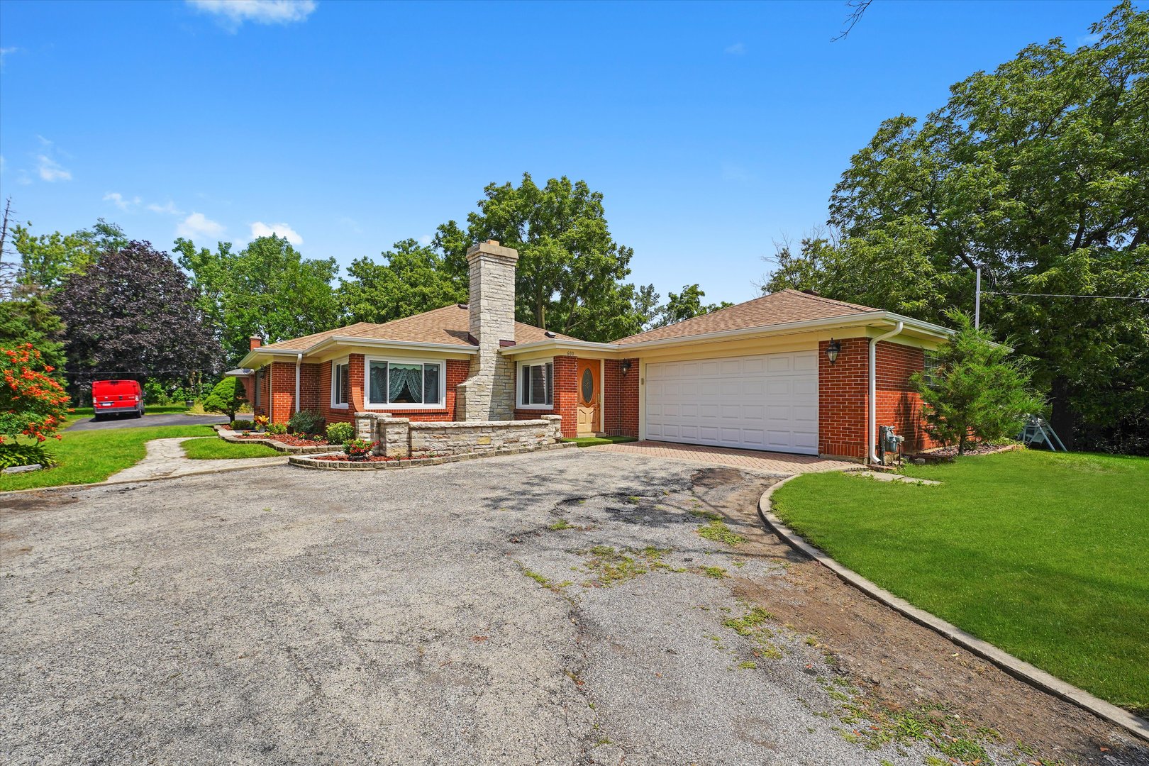 2N101 Glen Ellyn Road Glendale Heights, IL 60139 - Photo 23 of 34 a front view of house with yard and green space