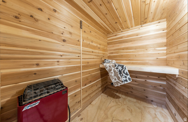 2001 Fielding Hill Lane Draper, UT 84020 - Photo 10 of 21 Sauna featuring wood walls, wood ceiling, and marble finish floors